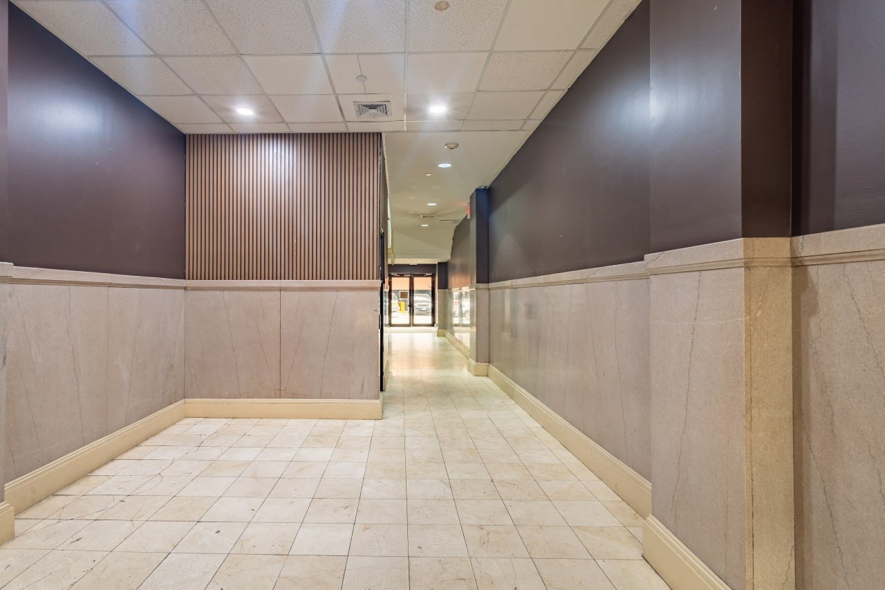Lobby corridor with modern wood accent wall