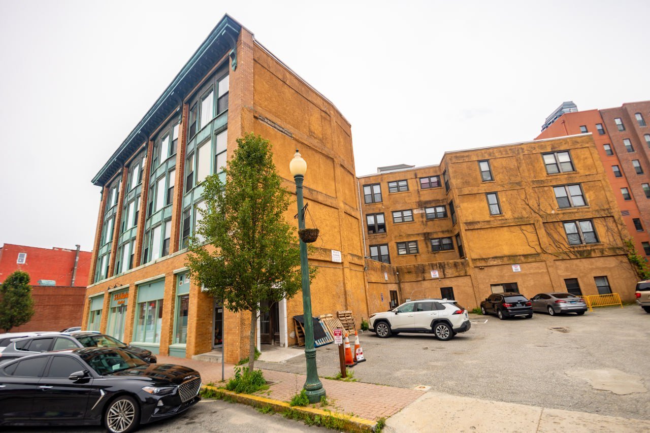 On-site parking lot behind the building